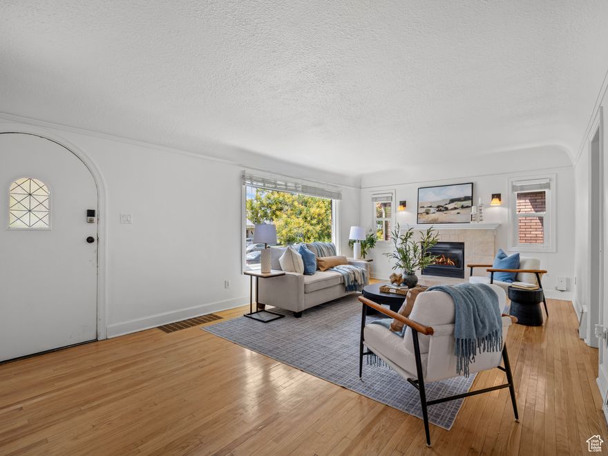 This highly desirable, legal duplex is just blocks from Liberty Park and offers endless potential, whether you're looking for a high-performing rental or a home where you can live in one unit and earn income from the other. The main unit boasts 3 spacious bedrooms and 2 bathrooms across 2,102 sq. ft., featuring a bright kitchen with its own dining space, a large family room, a separate dining area, and a full basement family room that's perfect as a hangout spot or private home office. The charming basement apartment includes 1 bedroom, 1 bathroom, and plenty of rental or guest potential, making it ideal for investors or homeowners alike. Property has a BRAND NEW ROOF, and already features fresh paint, an updated shower unit, newer flooring, and a convenient 2-car garage. Plus, the inspection report is complete and available for the next buyer to help save on costs. This is a rare opportunity in a prime location - come see this duplex while it lasts! Please add any closing costs you would like to the purchase price, if your buyer is requesting them.