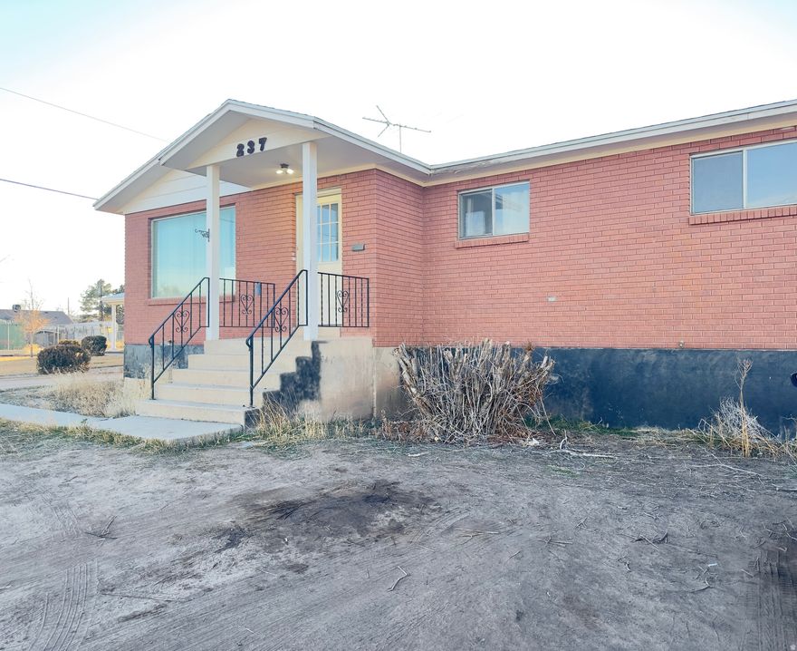 This charming brick home represents a unique blend of comfort and opportunity in a sought-after location. Whether you're looking to settle down or expand your investment portfolio, this property is a must see! Schedule your showing today to explore It's full potential.