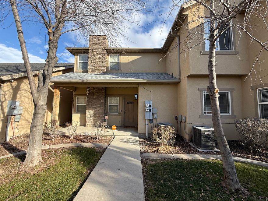 Adorable Townhome in Split Mountain Villa! Grandma has taken excellent care of this lovely 3 bedroom 2.5 bathroom unit with a 2 car garage. The 9 foot ceilings on the main level make it feel very open and the upstairs has a bonus landing area that can be an office or play area! The roof is brand new and this is the only unit with new Leaf Guard rain gutters!  The working chair lift on the stairs can be included or removed. Come and see this clean, ready to be lived in townhome!  Square footage figures are provided as a courtesy estimate only and were obtained from county records .  Buyer is advised to obtain an independent measurement.