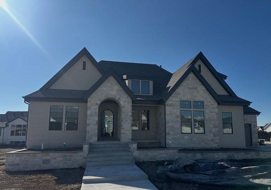 LOT# 321 in The Preserve by Symphony Homes. (Estimated to be complete February 2026) Step into luxury with this stunning home designed for comfort, style, and functionality. The main-floor primary suite is a true retreat featuring a spa-like bath with a freestanding tub, double vanities, and a spacious walk-in closet complete with a custom closet butler system and stackable laundry. The chef's kitchen is sure to impress with ZLINE appliances, a built-in column refrigerator and freezer, and an expansive butler's pantry for extra prep and storage space. Downstairs, you'll find a beautifully finished basement with a private bath for each bedroom, a full wet bar, a huge game room, its own laundry, and an active radon system already in place. Throughout the home, thoughtful designer touches abound-ceiling beams, custom millwork, and a built-in mudroom bench create a timeless and high-end feel. Enjoy outdoor living on the covered deck, and don't miss the bonus room above the garage. The elegant iron front door sets the tone for everything you'll find inside.