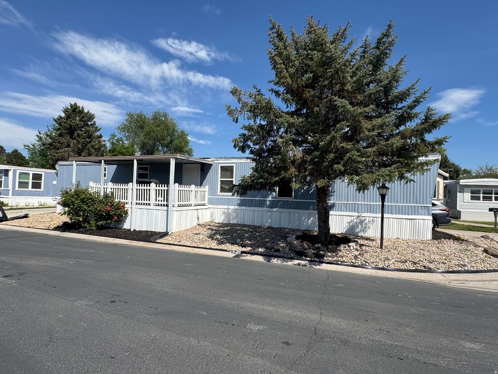 Photo of 4501 S LITTLE MOUNTAIN DR W #66, Taylorsville, UT 84123 (MLS # 2156955)