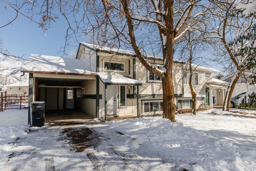 Welcome to this beautifully updated 2-bedroom, 2-bathroom, two-level twin home in desirable North Logan. With no HOA and no monthly fees, you get the freedom of homeownership without the restrictions or added costs of a townhouse community.  This home has been thoughtfully refreshed with new windows, new carpet, LVP flooring, and fresh paint, making it truly move-in ready. The high vaulted ceilings create an open, airy feel that makes the space feel larger and inviting.  Outside, you'll find a fully fenced backyard perfect for kids, pets, or entertaining. Enjoy the back deck, dedicated garden area, and convenient RV parking along the side - features that are hard to find at this price point.  If you've been looking for an affordable home in North Logan with privacy, updates, and no HOA fees, this is it. Homes like this don't last long - schedule your showing today before it's gone.