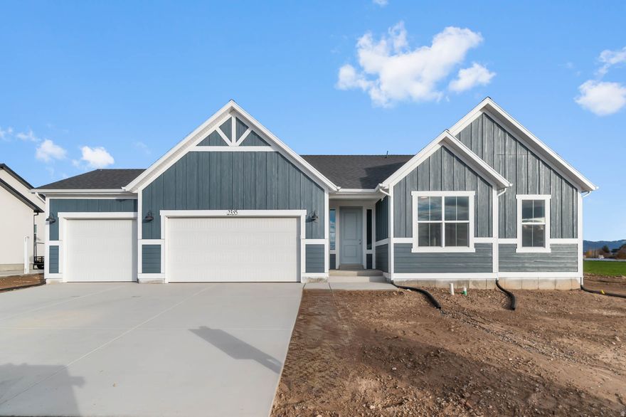 Come see this beautiful brand new 2000 Farmhouse, where classic charm meets modern design. This stylish home features white laminate cabinets, quartz countertops, and stainless steel gas appliances, creating a bright and functional culinary space. The interior boasts laminate hardwood, tile, and carpet flooring, enhanced by can lighting and large Craftsman base and casing for timeless appeal. A box window in the kitchen nook and owner's bedroom adds warmth and natural light throughout. Additional highlights include a 3-car garage with keypad and exit door, tile kitchen backsplash, Christmas light outlets, tankless water heater, and a cozy gas log fireplace. The grand owner's bathroom offers a great retreat, featuring cultured marble surrounds and elegant satin and brushed nickel hardware. Designed for comfort, efficiency, and everyday elegance, this farmhouse offers the perfect blend of modern living and classic style.