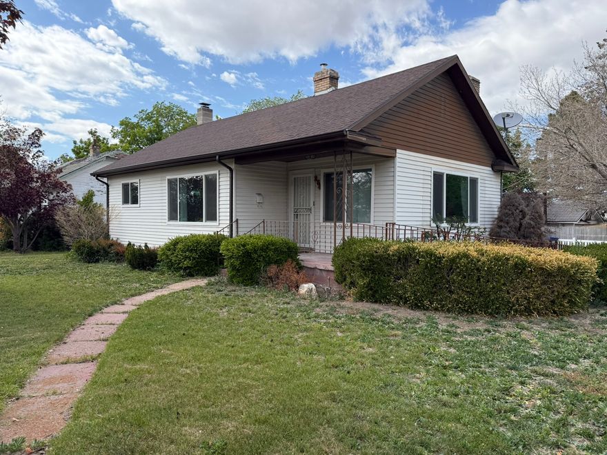 Beautifully maintained home in a prime location near Tooele High School and within walking distance to West Elementary School. This inviting property features an open and spacious floor plan filled with natural light from the large living room windows. Enjoy a shaded backyard with mature trees, perfect for relaxing or entertaining. Recent upgrades include brand-new main-level windows, while the cozy wood-burning stove adds warmth and character. The spacious kitchen offers abundant counter space and cabinetry, and the basement provides exceptional storage options. An air purifier is also included, adding extra comfort and convenience to this move-in ready home. Buyer to verify listing information and square footage.