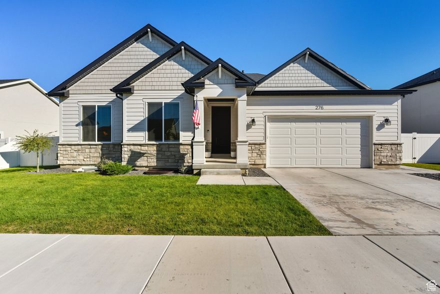 Welcome home to this beautifully designed single story home featuring 3,870 sq. ft. of thoughtfully crafted living space just minutes from Hobble Creek Canyon. Built only three years ago, you can enjoy open-concept living with upgraded finishings, fiber internet, 9 foot ceilings, 8 foot doors, and a spacious layout that's perfect for gathering and entertaining. The gourmet kitchen boasts double ovens, quartz countertops, and premium cabinetry. The unfinished basement offers incredible potential, already plumbed for a second kitchen, it's ready to become a full second living space. Outside, you'll find a .21-acre fully fenced yard, permanent Gemstone holiday lighting, wide roads and nearby parks, giving the neighborhood a peaceful, welcoming feel.