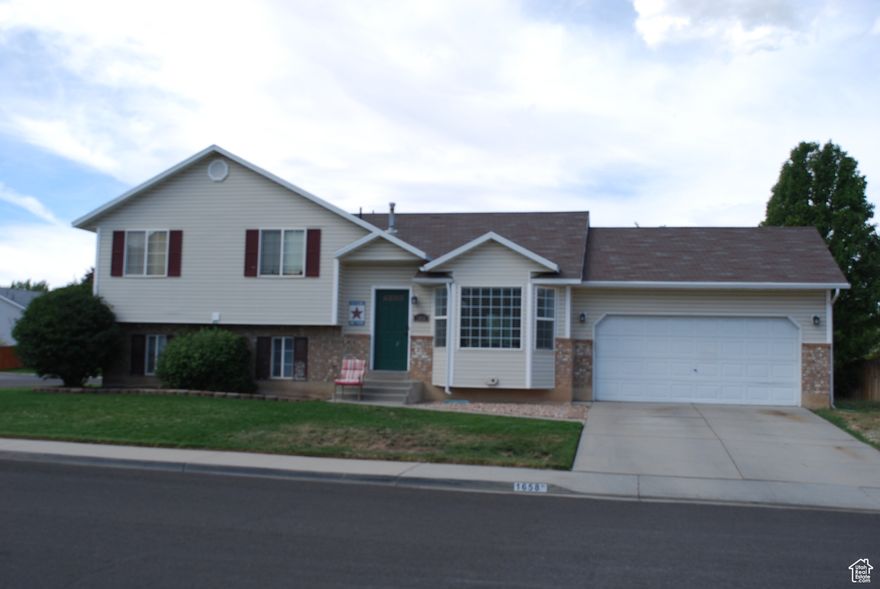 Seller is willing to give $5,000 allowance for updating or flooring allowance.  Great home in wonderful neighborhood!  Open floor plan with large living room and family room.  New air conditioner and water heater within the past year.  Newer high efficiency furnace.  Den could be bedroom but is missing a closet.  Large stamped concrete patio.