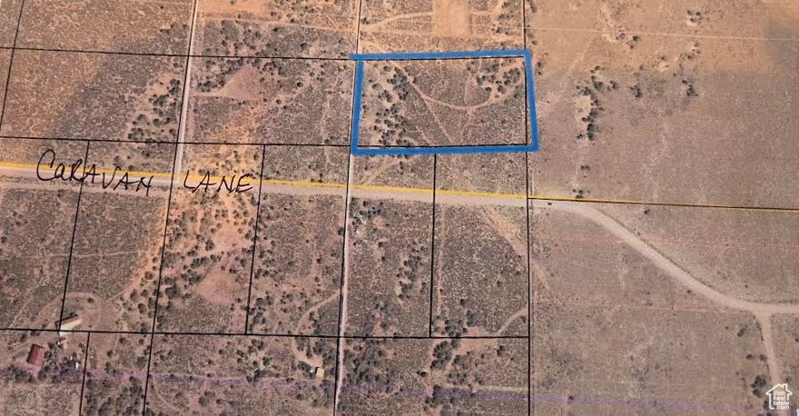 SUNDANCE WEST!!  5 acres at the east end of Caravan Lane on the north side of the road, bordering the Brotherson Ranch!  Power, well, and septic may be available at buyer's expense, or just come self-contained!  This lot has such great views of the Uintahs!  Year 'round access!  Come enjoy!