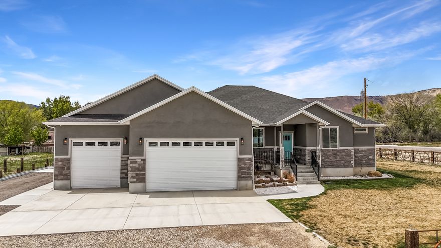 Welcome to this beautifully crafted 2022 home in Ferron, Utah-where modern comfort meets small-town charm and wide-open space. Offering 6 spacious bedrooms and 3.5 bathrooms, this home is thoughtfully designed for both everyday living and long-term versatility. Set on a generous half-acre lot, the property provides plenty of room to enjoy the outdoors, whether you're entertaining, relaxing, or expanding your vision. Inside, you'll find a bright, open-concept layout with contemporary finishes, creating a clean and inviting atmosphere throughout. A standout feature is the fully finished basement apartment, complete with its own private entrance and second kitchen-ideal for rental income, multi-generational living, or a private guest retreat. The flexibility this space offers makes it a rare and valuable find. Even better, all furniture in the home is negotiable, offering a turnkey opportunity for buyers looking for convenience or an easy investment setup. Also includes security system currently in place. Don't miss your chance to own a nearly new home with built-in income potential in the peaceful community of Ferron.