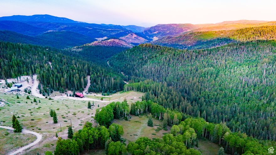 This is the last lot available in West Village under $100,000 at Eagle Point Resort. The seller also owns Lot 28 and would entertain selling both lots for $190,000. This would be a combined acreage of 1.71 acres. Currently this lot is summer access only but the Elk Meadows Special Service District is required to plow the road once a home is built to gain access. There is a new water main to the cul-de-sac. Buyer would be responsible for buying a water pit and bringing water to the lot if/when they build a home. Power is Rocky Mountain Power; buyer would be responsible for bringing it to lot from nearest pole if/when a home is built. Dues listed are HOA and EMSSD which include road, snow removal and water.