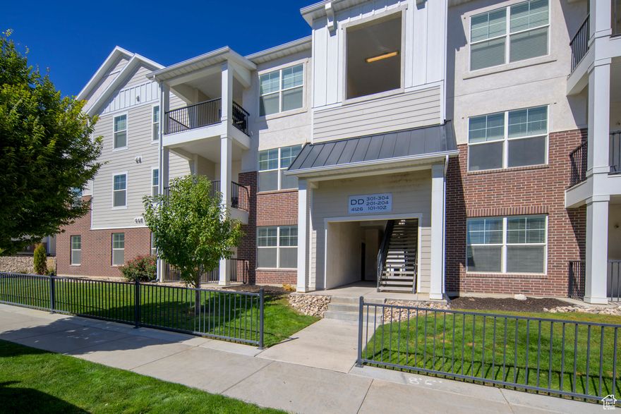 ** PRICE IMPROVEMENT** CHARMING MAIN LEVEL CONDO **.  Very desirable EXCHANGE community main level condo with the garage access through the laundry room. 3 bedrooms with a beautiful owners suite including  walk in closet and bathroom! Lots of windows to bring in natural sunlight! Beautiful kitchen that boasts lots of spacious cabinets, quartz countertops, bar top for extra seating, and pantry. The dining area is spacious  and overlooks the living area. Walk out the side door to a charming fenced patio to enjoy on nice summer nights. Perfectly located with shopping, dining, recreation, entertainment, and schools close by.  Square footage figures and facts obtained from county records. Buyer and/or buyer's agent to verify all.