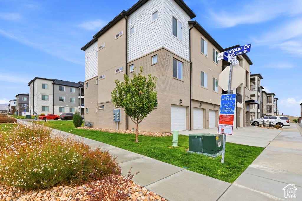 Photo of 13536 S POOLE DR #E202, Riverton, UT 84096 (MLS # 2192699)
