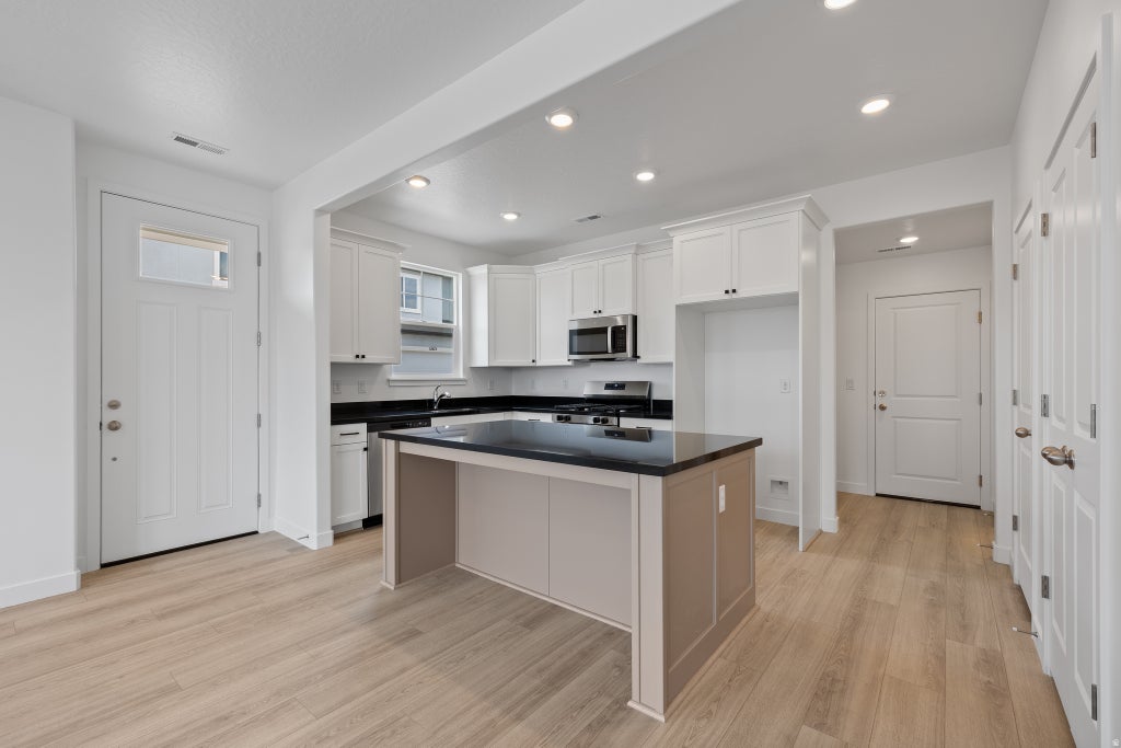Photo of 6757 W JUMBO ROCKS LN #249, Herriman, UT 84096 (MLS # 2171536)