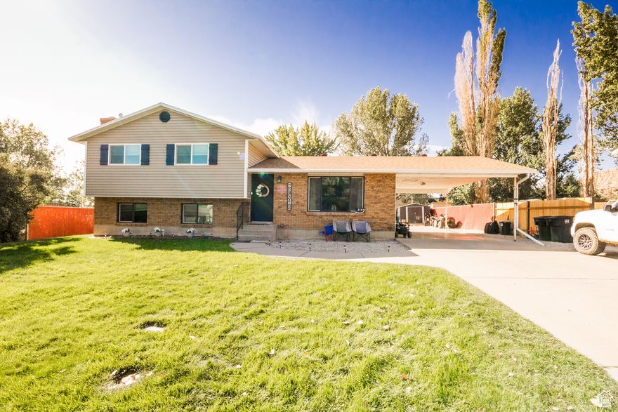Welcome to this beautifully maintained 1,702 sq ft tri-level home nestled in the heart of Cottonwood Heights, one of the most sought-after neighborhoods in Vernal! Boasting 4 bedrooms and 2 bathrooms, this well kept home offers the perfect blend of comfort, style, and functionality; ideal for growing families or those who love to entertain. Step inside to find an updated modern kitchen with ample cabinet space, seamlessly connecting to open living and dining areas. The home has been lovingly cared for by only two owners, reflecting true pride of ownership. There is a fully automatic sprinkler system, beautifully maintained landscaping, and a spacious backyard ready for gatherings or quiet evenings outdoors. Don't miss our on your opportunity to see all this amazing home has to offer!   Square footage figures are provided as a courtesy estimate only. Buyer is advised to obtain an independent measurement.
