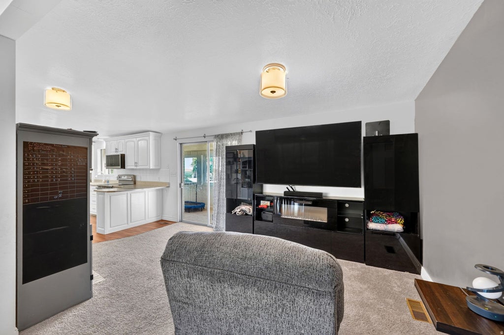 Photo of 1045 PEACH DR, Ogden, UT 84404 (MLS # 2166444)