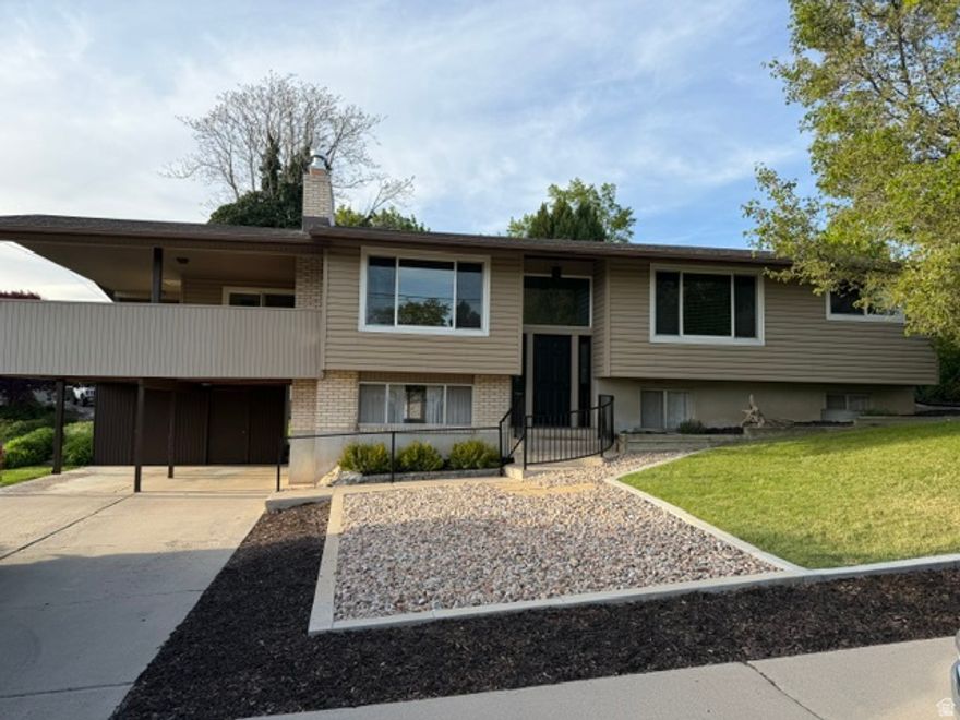 Beautiful Remodeled Home in the Desirable Orem Neighborhood of Sunset Heights East This home offers privacy that is so rare in an established neighborhood Along with privacy are unbelievable views from the front windows and the fully covered deck, complete with a gas/brick fireplace. The landscaping is lovely and the home has all fresh updates as well as a new roof, new water heater, updated main floor windows, bathrooms and kitchen, new flooring, all new paint and the home can be purchased with the furnishings. The views across the street are of horses, a beautiful orchard and the occasional fox. The views to the west are another garden area and Lake views. The quietness inside, the privacy and the convenient location make this a rare find. The same family lived here from the time it was built until just recently.
