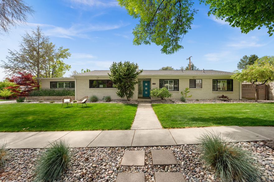 This is the single-level mid-century you've been waiting for--finally. Thoughtfully updated with a clean, modern feel while still honoring its mid-century roots, this home brings together crisp lines, warm details, and the kind of layout that just works. A cheery front door paired with a beautiful stained-glass window creates the perfect first impression. Single-level living keeps everything easy, while the open kitchen, dining, and living spaces flow seamlessly together (perfect for everyday life and hosting nights that go a little longer). And then there's the wall of glass. Flooding the living room with natural light and opening straight to the patio, it's the moment that makes this home unforgettable (and yes... it's ready for that hot tub). Inside, the details continue to deliver--terrazzo fireplace, built-ins for days, full wall bookcases, and even a vintage telephone nook that'll make you smile. With 4 bright bedrooms and 2.5 baths, the layout hits that rare sweet spot, including a spacious primary suite with its own private deck. Set on a quiet circle with genuinely friendly neighbors (the kind you'll actually like), plus beautiful front and backyard landscaping. Huge two-car garage with extra height and serious storage means room for all the gear (and then some). And the location? Walk or bike to Emigration Market, Crema for a coffee, and onto Foothill Village for endless treasures. Straight shot to the U of U and freeway access. This is the kind of home that feels good the second you walk in and in a spot that's just as good.