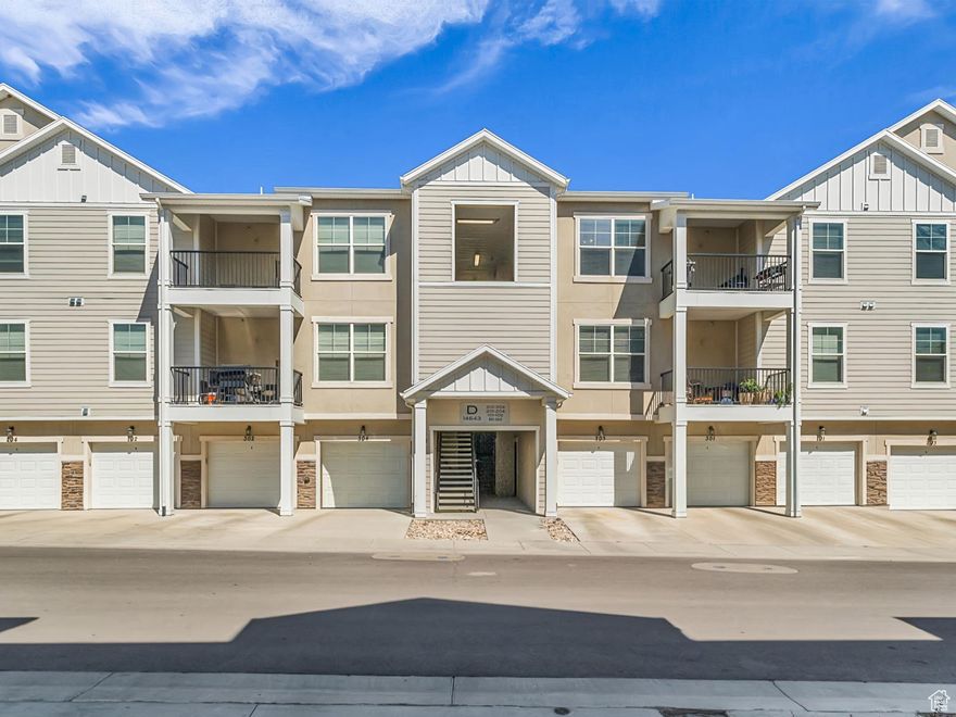Welcome to Saddlebrook! This 3 bed, 2 bath condo is move-in ready and comes with a private 1-car garage. The top-level location gives you vaulted ceilings in the living room and primary suite, along with extra natural light and no upstairs neighbors. The layout is open and comfortable, with a private balcony perfect for grilling or relaxing. The community has so much to offer: pool, clubhouse, basketball courts, and playground. You're also just steps from Lee's Marketplace, the new SLCC and U of U campus, and Zions Bank Stadium. Juniper Canyon Park and trail system are right around the corner, and Mountain View Village with all its dining and shopping is just a quick drive away. Whether you're looking for a new place to call home or a solid investment opportunity, this condo checks all the boxes.