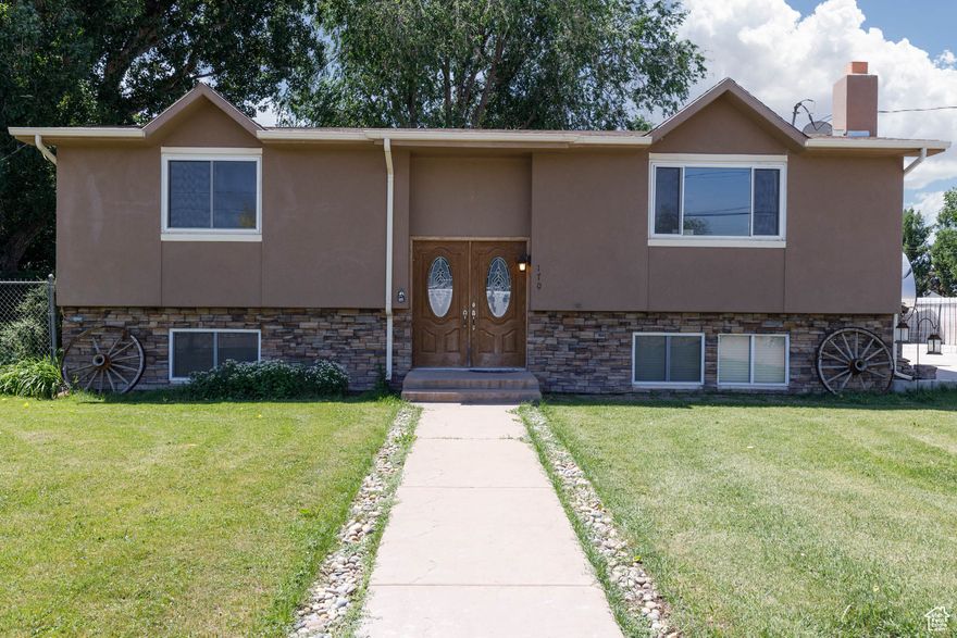 Charming 4-bed, 2-bath split-level home in peaceful Monroe, UT! Enjoy two living rooms, a spacious deck, mature trees, and stunning mountain views. Huge fenced yard with a 1,250-yard concrete pad-perfect for RVs, toys, or a future shop. Two parcels offer potential to sell the corner lot. Room to grow, relax, and enjoy small-town living at its best. Don't miss this unique opportunity!