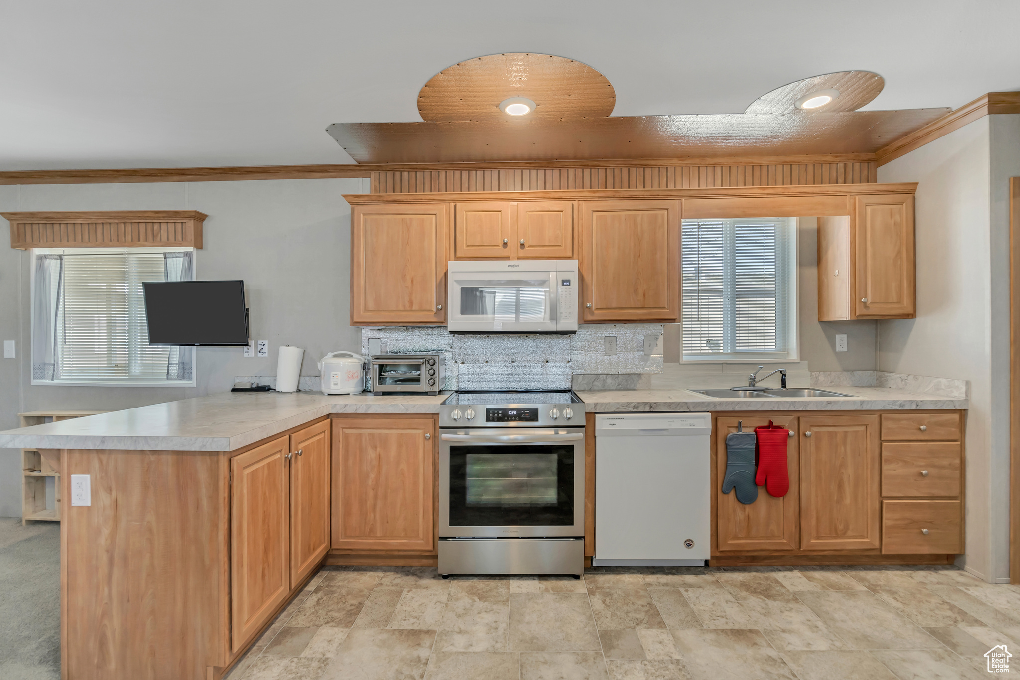 This charming Mobile Home located on the end row of the subdivision which allow you to view and enjoy the open space. Close to shopping centers and restaurants. Few minutes to I15 and I215. Home boast with 3 bedrooms and 2 Bathrooms. Sellers just turned the landscaping into enjoyable xeriscaping. All furniture will be included with the right price.