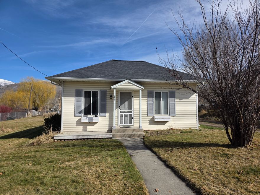 Darling 1914 Bungalow in the heart of Hyrum. 2 bedroom 1 bath nestled on  .31 acre, fully landscaped with sprinkler system, peach tree, cherry tree, raspberry bushes. Small home with big personality, this won't last long.