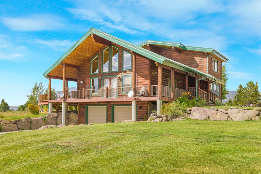 https://youtu.be/GxZcCKqG4hs Welcome to your dream mountain lake escape-where luxury meets lifestyle and every detail invites connection, comfort, and tranquility. This fully furnished, turnkey cabin is perched on a beautifully landscaped corner lot with expansive lake and mountain views. Located just 15 minutes from Yellowstone National Park and steps from Henry's Lake State Park. This high-performing vacation rental doubles as a warm and welcoming family gathering place. Inside you will love the main floor master and a 2nd on suite bedroom, soaring wood-beamed ceilings, and a floor-to-ceiling stone fireplace create an atmosphere of rustic elegance. The new kitchen boasts granite countertops, stainless appliances, and a large island perfect for sharing meals and memories. Updated bathrooms offer boast heated floors, bidet toilets and beautiful tile. Outdoors, gather by the firepit, hit the lake for trophy fishing, explore nearby trails, or unwind on the spacious deck and watch the sunset from the jacuzzi. Designed for both income and enjoyment, this is more than a home-it's the relaxing lake lifestyle you and your family deserve.