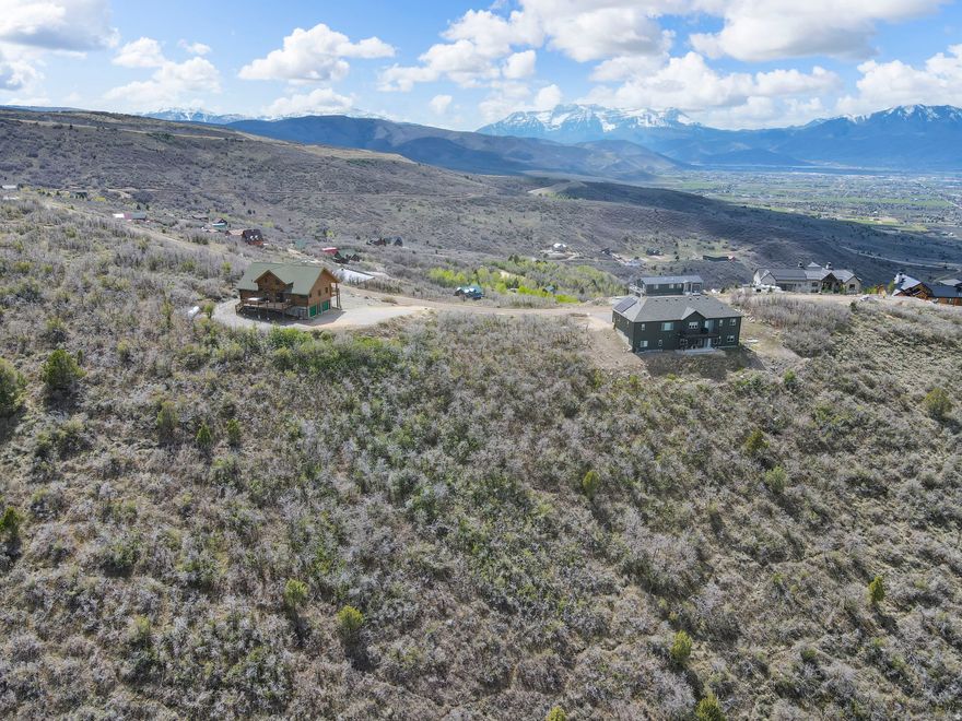 Discover elevated mountain living at 1993 Ridge Line Dr, located inside the gated Timber Lakes community. This exceptional homesite offers sweeping panoramic views in every direction, delivering privacy, scenery, and a true alpine setting. Enjoy direct access to extensive trail systems for snowmobiling and off-road recreation, all while remaining within easy reach of Deer Valley, Park City, and their year-round dining, shopping, and resort amenities-just 30 minutes away. Whether you build with the preferred builder or bring your own plans, this property provides the ideal canvas for a custom mountain retreat. A rare opportunity to secure both lifestyle and location. Contact the listing agent for additional details and private access.