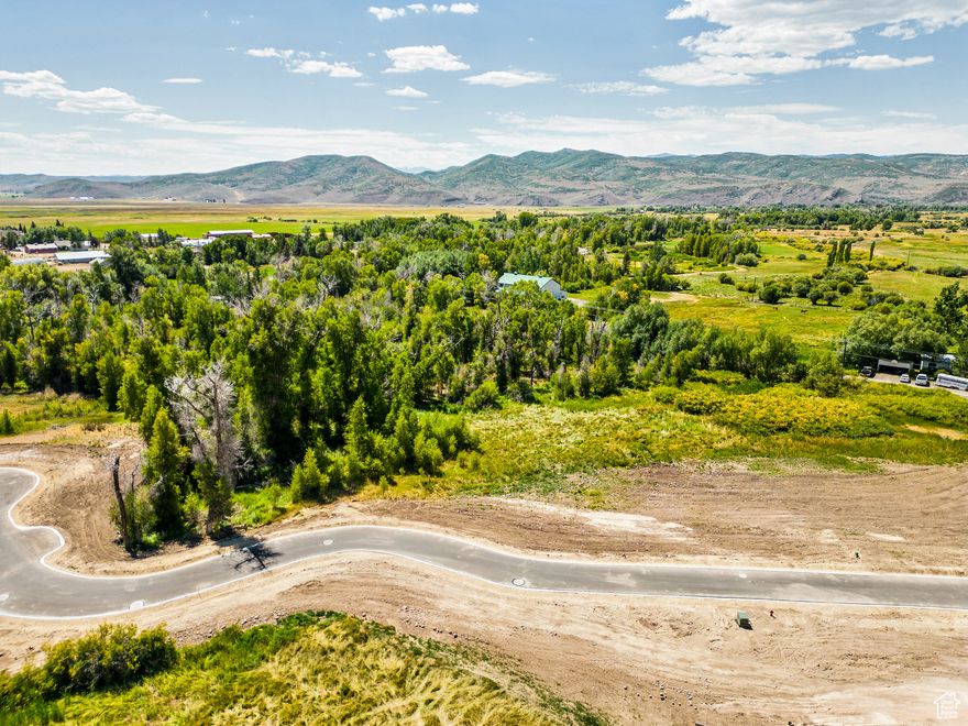 Infrastructure is now complete. New launch incentives will apply for the next 3 sales. Call for details. River Haven Retreat is for those seeking a graceful escape from the rush of city life-where the focus shifts from chasing to simply being. Here, 16 fully improved, ready-to-build, and thoughtfully planned single-family homesites share rare access to the Weber River, offering a lifestyle rooted in nature, serenity, and intention. All of the lots present a flat building envelope, with the flexibility to build at your own pace and even incorporate an attached ADU. At River Haven, slowing down becomes second nature, and the connection to land and community is unmistakable. When it calls to you, you'll know you've found more than a homesite-you've found your haven.