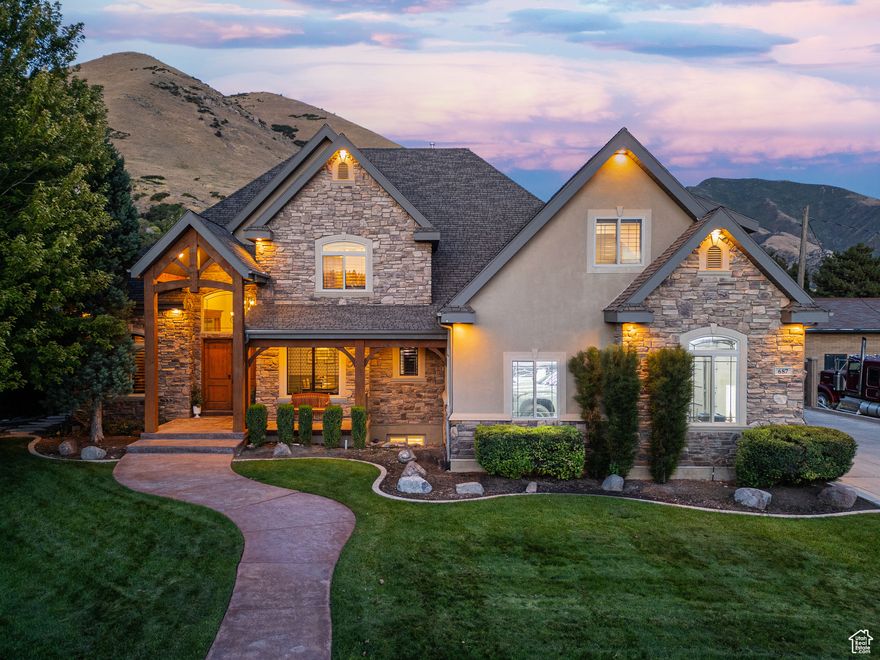 Perched at the mouth of Hobble Creek Canyon, this extraordinary estate blends luxury, creativity, and lifestyle in ways rarely seen. The main level has been refreshed with new LVP flooring, new carpet, fresh paint, and designer touches including custom wainscoting and wallpaper. Anchoring the space is a grand master retreat on the main floor, offering elegance and privacy in one of the home's most desirable features.  Upstairs, the home provides an en-suite secondary suite, a massive office, an oversized bonus room, and laundry on every floor for unmatched convenience. The basement adds incredible flexibility with a full ADU, a second kitchen, and sprawling recreation spaces.  The centerpiece of the home is a private theater unlike anything you've ever experienced. Once a full basketball gym, this space has been transformed into a cinematic showpiece with a mezzanine, dramatic theater seating, and a 50+ speaker Atmos system that delivers immersive sound on par with world-class theaters. A massive gym, oversized kitchen, and abundant storage further set this home apart.  Outdoors, you'll find a resort-style pool with slide, a pool house beneath a cascading water feature, two gas firepits, and a wood-fired pizza oven perfect for gatherings. The property connects directly to paved Hobble Creek trails and includes its own BMX pump track and easy access to mountain biking. The garage has been upgraded with new flooring, lighting, paint, EV plug, and new motor and opener, while a large shed with a garage door offers additional storage. Mechanical updates include a brand new furnace and AC, plumbing and gas manifolds, three 50-gallon water heaters, and a water softener.  This is truly a once-in-a-lifetime opportunity to own a home that redefines what it means to live, entertain, and play.