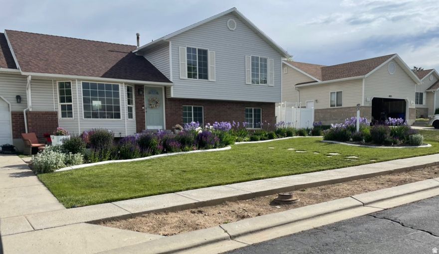 This beautifully updated north facing 2 story sits on a nice lot in a quiet West Jordan neighborhood and offers the perfect blend of space, style, and comfort. With 6 bedrooms and 3 full bathrooms, there's room for everyone whether you're looking to accommodate a growing family, set up multiple work from home spaces, or host guests with ease. The main level welcomes you with updated flooring, and a thoughtfully designed layout that's ideal for both everyday living and entertaining. The kitchen features quartz countertops and a seamless flow into the dining and living areas.  Downstairs, the fully finished basement adds even more functional living space, including a second family room, 3 bedroom, a water softner, and a furnace with a built in purifier. This home features a big backyard fully fenced with a large RV pad for all your outdoor toys. This home is truly move in ready and located in a welcoming, quiet circle close to schools, shopping, Bangerter, and more. Don't miss this opportunity, schedule your showing today and see all that this West Jordan gem has to offer. Square footage figures are provided as a courtesy estimate only. Buyer is advised to obtain an independent measurement.