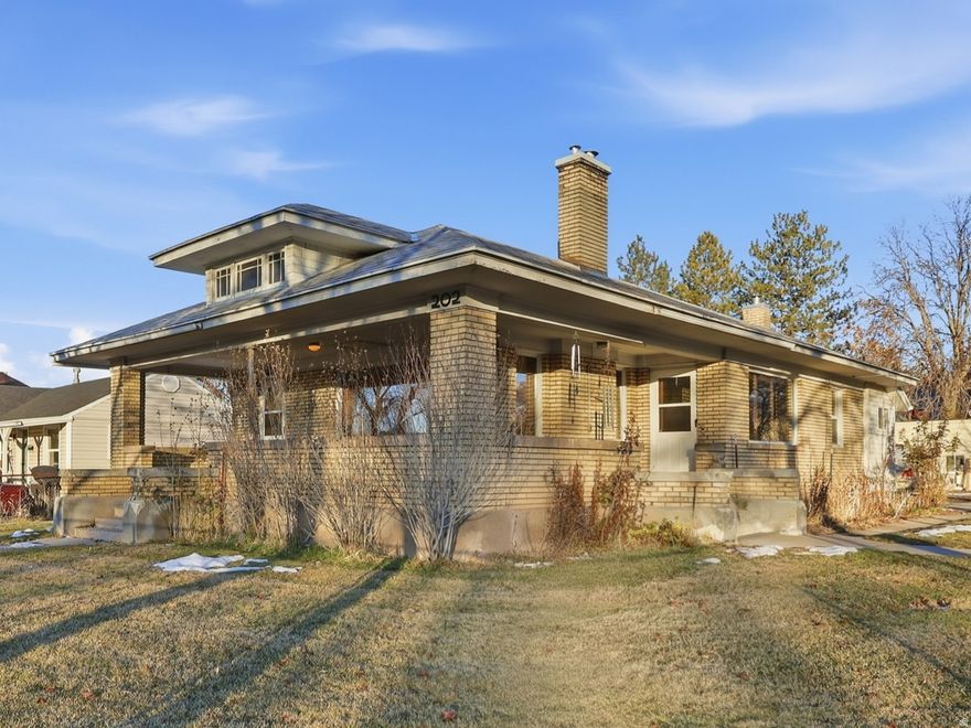 This timeless all-brick bungalow offers comfort, character, and beautiful mountain views. A welcoming front porch invites you to relax and enjoy the surroundings, while the fully fenced property provides both privacy and space. Inside, the home features plantation shutters throughout, a spacious formal dining room perfect for gatherings, and a thoughtfully designed layout filled with natural light. The property also includes a detached owner ADU, ideal for extended family, guests, or rental income along with a separate shop for hobbies, projects, or additional storage. A two-car garage adds convenience and ample parking. Outdoors, enjoy expansive yard space perfect for gardening, or entertaining,  Come see it for yourself; you won't be disappointed.