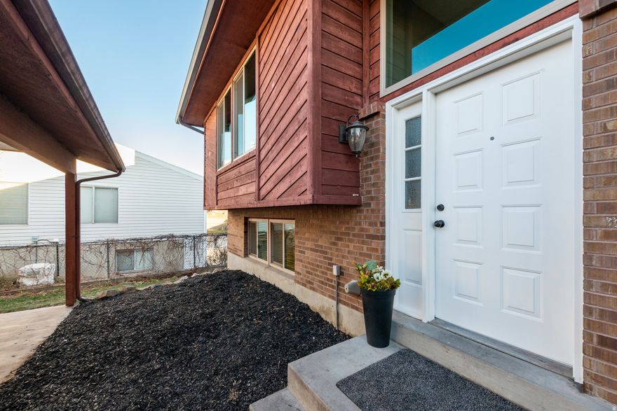 Discover the perfect blend of comfort, style, and outdoor living in this beautifully updated end unit condo! An absolute rarity in today's market. Step inside to find a thoughtfully designed living space that maximizes every inch with modern finishes, fresh updates, and new vinyl windows throughout creating that bright, inviting feel. But the true showstopper is outside: your own expansive, fully fenced private backyard. Whether you dream of gardening, entertaining, relaxing under the stars, or giving pets room to roam, this outdoor oasis offers possibilities you won't find in typical condo living. Enjoy the completely updated interior with contemporary finishes. A generous great room overlooking the adorable, modern kitchen offering a separate, large dining area. A second half bath with laundry facilities and an easy guide slider opening the back yard to extended living space. Slip away to the upper level, featuring two large bedrooms, a fabulous balcony overlooking our Wasatch Mountain skyline, and a well-appointed bath with new gorgeous granite counter. This little dynamite offers low maintenance living and includes New Furnace and AC, plus an exterior shed within the two car carport, offering perks similar to a single family home! This is a rare opportunity to enjoy privacy, style, and outdoor space at an unbeatable size and value. Homes like this don't come around often-make it yours.