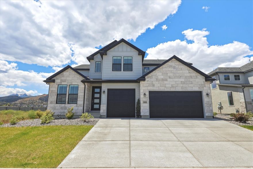 Beautiful newer construction tucked into a quiet Herriman cul-de-sac offering the feeling of country living while still being close to city conveniences. Oversized windows showcase breathtaking mountain views throughout. With 6 bedrooms, 5 bathrooms, dedicated office, attached ADU with separate entrance, spacious yard, and nearly 3,700 sq ft, this home offers a rare combination of size, flexibility, and newer construction that is hard to find in the area. Modern finishes and timeless touches make this home ideal for multigenerational living and everyday luxury. Select furnishings negotiable.