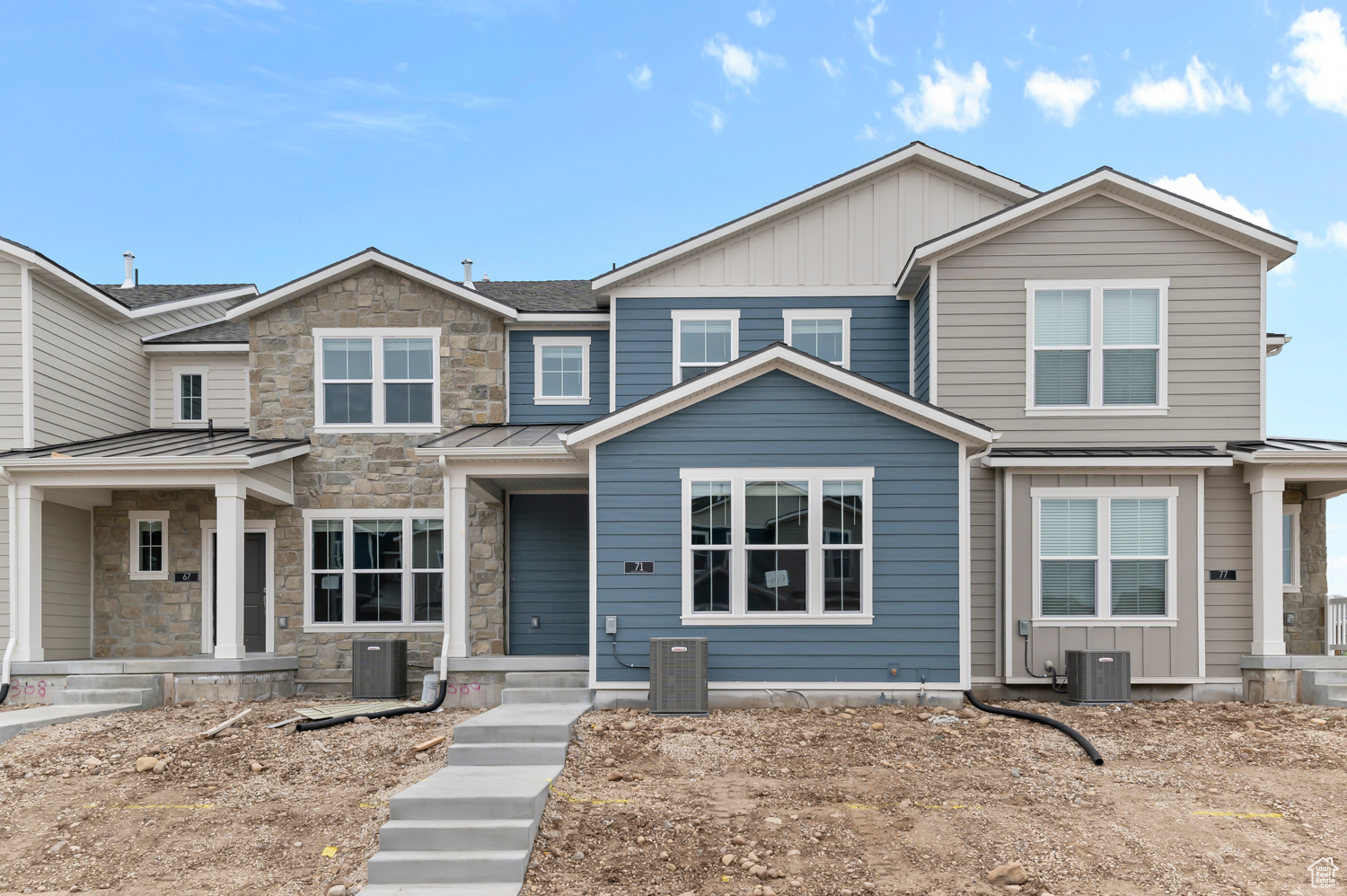 This brand new Bremerton town home combines sleek modern finishes with everyday functionality. Featuring gray laminate cabinets, quartz countertops, and stainless steel gas appliances, this kitchen is ready for both cooking and entertaining. The home is finished with a mix of laminate hardwood, vinyl tile, and carpet flooring for a comfortable and versatile living space. Enjoy a relaxing retreat in the owner's bathroom, complete with cultured marble shower surrounds and brushed & satin nickel hardware. Comes fully landscaped and located in a great community!