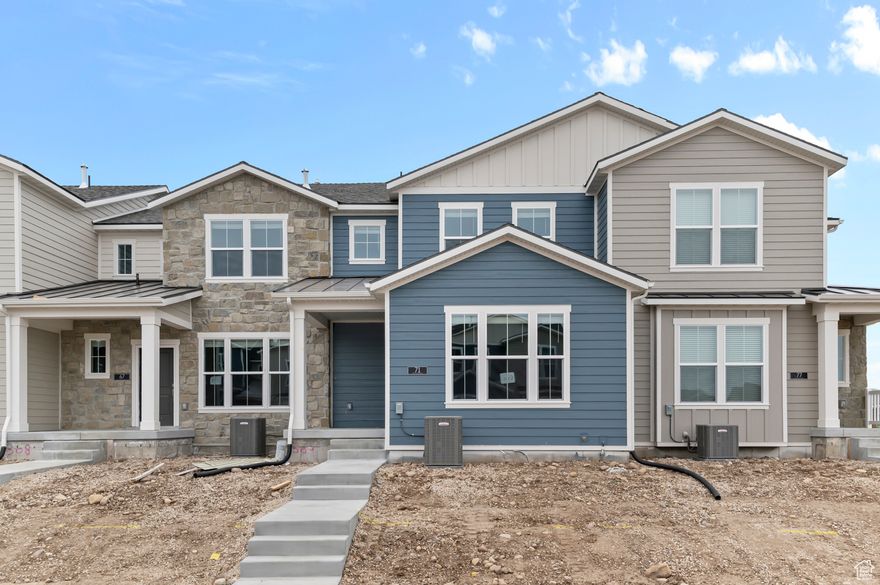 This brand new Bremerton town home combines sleek modern finishes with everyday functionality. Featuring gray laminate cabinets, quartz countertops, and stainless steel gas appliances, this kitchen is ready for both cooking and entertaining. The home is finished with a mix of laminate hardwood, vinyl tile, and carpet flooring for a comfortable and versatile living space. Enjoy a relaxing retreat in the owner's bathroom, complete with cultured marble shower surrounds and brushed & satin nickel hardware. Comes fully landscaped and located in a great community!