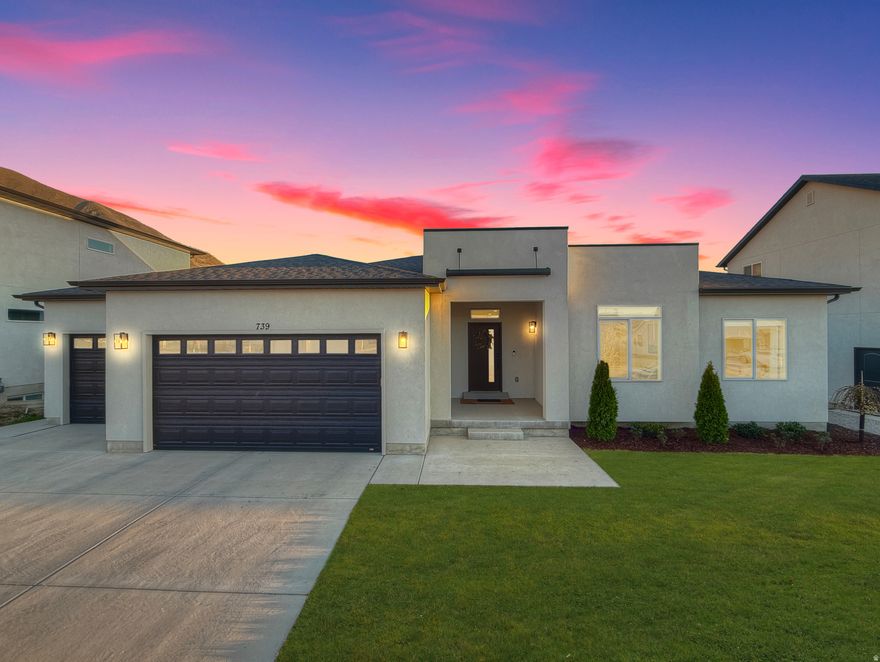 ** OPEN HOUSE: Saturday 3/28 from 10:00 AM  4:00 PM ** Nestled at the base of the mountains in Mapleton, this beautifully designed rambler offers breathtaking views, exceptional functionality, and built-in income potential! This home features true main-level living with large windows that showcase the surrounding mountain views. The kitchen is thoughtfully designed with painted cabinetry and upgraded appliances, seamlessly flowing into the main living area anchored by a built-in fireplace. The open-concept layout is both spacious and inviting - perfect for entertaining. The primary suite includes a fully upgraded bathroom with a floor-to-ceiling tiled walk-in shower with dual shower heads, a dual vanity, and a generously sized walk-in closet with ample storage. Additional main-level highlights include a built-in mudroom bench with lockers and added storage, as well as overhead storage in the three car garage for optimal organization. Downstairs, a fully finished 3-bedroom, 2-bath basement apartment offers a private entrance, excellent natural light with above-grade windows, and has consistently rented for $1,850/month, with potential for more. Whether used as a rental, multi-generational living space, or an extension of the home for a theater or recreation area, the layout is functional and versatile. Outside, you'll find a large backyard and a spacious concrete patio-ideal for outdoor dining and entertaining. Located near walking trails, city parks, and nearby golf courses, this home also offers quick access to Highway 6, I-15, Spanish Fork Canyon, and downtown Spanish Fork. All main floor and basement apartment appliances are included with a full-price offer. Schedule your private showing today! Square footage figures are provided as a courtesy estimate only and were obtained from building plans. Buyer is advised to obtain an independent measurement.