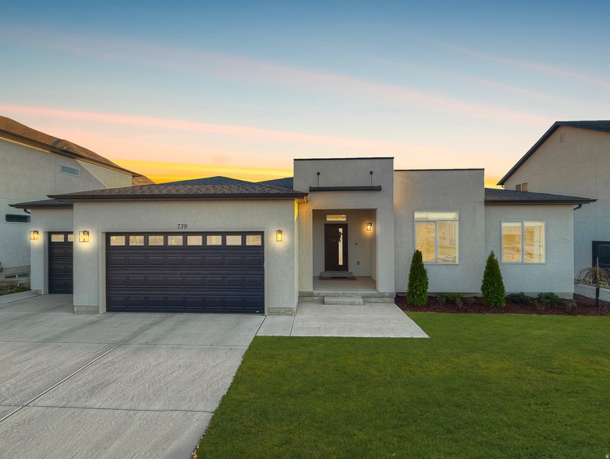 ** OPEN HOUSE: Saturday 3/28 from 11:00 AM  4:00 PM ** Nestled at the base of the mountains in Mapleton, this beautifully designed rambler offers breathtaking views, exceptional functionality, and built-in income potential! This home features true main-level living with large windows that showcase the surrounding mountain views. The kitchen is thoughtfully designed with painted cabinetry and upgraded appliances, seamlessly flowing into the main living area anchored by a built-in fireplace. The open-concept layout is both spacious and inviting - perfect for entertaining. The primary suite includes a fully upgraded bathroom with a floor-to-ceiling tiled walk-in shower with dual shower heads, a dual vanity, and a generously sized walk-in closet with ample storage. Additional main-level highlights include a built-in mudroom bench with lockers and added storage, as well as overhead storage in the three car garage for optimal organization. Downstairs, a fully finished 3-bedroom, 2-bath basement apartment offers a private entrance, excellent natural light with above-grade windows, and has consistently rented for $1,850/month, with potential for more. Whether used as a rental, multi-generational living space, or an extension of the home for a theater or recreation area, the layout is functional and versatile. Outside, you'll find a large backyard and a spacious concrete patio-ideal for outdoor dining and entertaining. Located near walking trails, city parks, and nearby golf courses, this home also offers quick access to Highway 6, I-15, Spanish Fork Canyon, and downtown Spanish Fork. All main floor and basement apartment appliances are included with a full-price offer. Schedule your private showing today! Square footage figures are provided as a courtesy estimate only and were obtained from building plans. Buyer is advised to obtain an independent measurement.