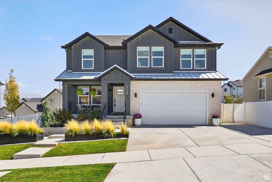 Why wait for new construction when you can have it all-now? This stunner offers a rare combination of smart upgrades, premium landscaping, & turnkey comfort. Unlike nearby new builds, this fully finished home features a walkout basement with a dry bar, built-in water fountain, and direct access to an immaculately landscaped backyard oasis. Terraced garden beds, conversation zones, in-ground trampoline, and mature trees make this space an entertainer's dream. Inside, you'll find thoughtfully designed spaces across 3 levels, including vaulted ceilings, quartz countertops, & seamless flow between living, dining, and kitchen areas & don't miss the 2nd laundry in basement. Energy efficiency shines with a solar panel system (2024 install) & wiring for an EV charger & hot tub. Utilities are stubbed (both electrical & gas) for a hot tub AND an outdoor kitchen.  Located in the sought-after Mount Saratoga/The Ridge neighborhood, this home gives you walkable access to trails, playgrounds, & a future planned downtown, all served by top-rated Alpine District schools. From smart systems to outdoor living upgrades, this is a home that's ready to enjoy-without the delays or added costs of building new.