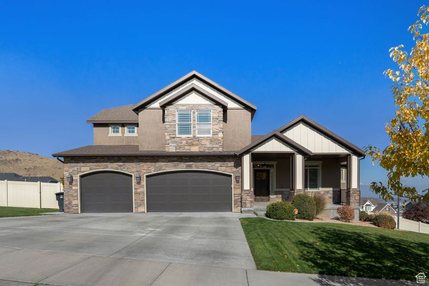 Breathtaking Views Overlooking the Salt Lake Valley and Blackridge Reservoir from this Spectacular Two Story Home located within Herriman's Premiere Lookout Ridge Neighborhood! Quality Finishes Throughout! Loaded with Upgrades including Custom Cabinetry; Gourmet Kitchen with Huge Island; Granite Tops; SS Appliances including Double Oven; Hardwood Flooring; Alarm System; Plantation Shutters; Fireplace; and Custom Wood Trim. The home has a fabulous floor plan including Main Floor Owner's Suite featuring a HUGE walk in closet, dual sink vanity and separate Tub/Shower with Euro Glass. The home is fully finished including the gorgeous walkout basement with kitchen, 6 beds (could use another rooms for a 7th), 4 bath 2 great rooms, exercise room and main floor office. Easy to take in the views from either the covered patio or covered deck. Feels Brand New! *Buyer to verify all information.