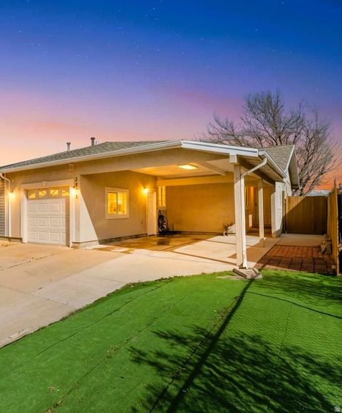 Photo of 3225 S JASON PL, West Valley City, UT 84119 (MLS # 2141168)