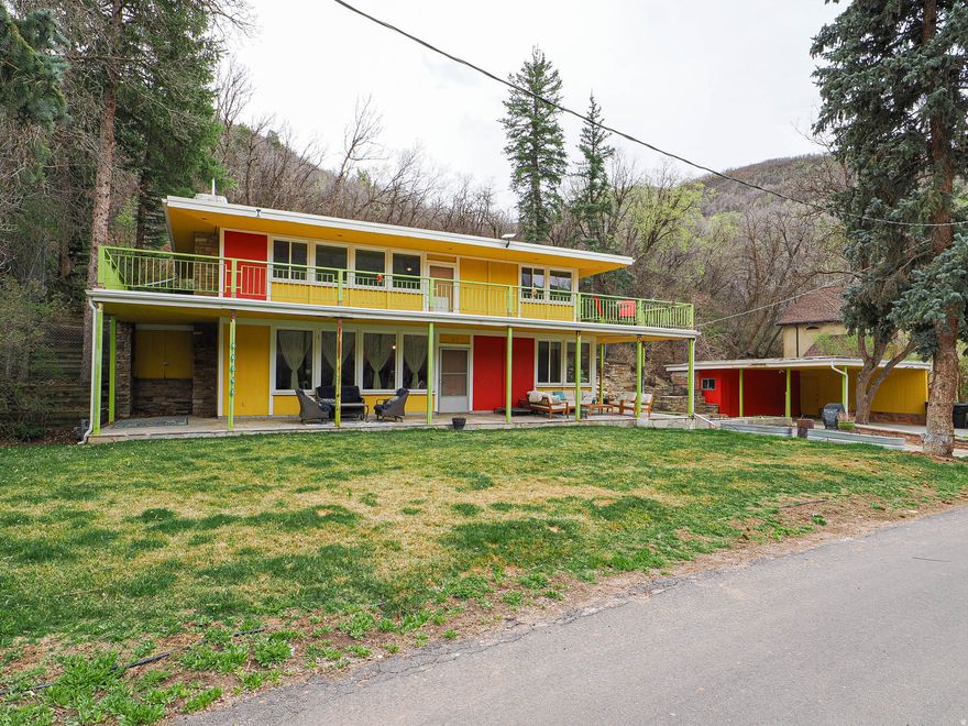 The best value in Emigration Canyon! Tucked into the serene beauty of Emigration Canyon, this distinctive mid-century modern home offers a rare blend of character, privacy, and potential. This 3-bedroom, 1-bath residence captures the timeless architectural charm of its era with clean lines, warm natural light, and a seamless connection to its surroundings. Inside, you'll find an inviting layout with comfortable living spaces and three well-proportioned bedrooms. The home is move-in ready while also offering room to grow, with existing plumbing in place for a second bathroom-an ideal opportunity to add value and functionality. Step outside and enjoy the peaceful canyon setting, where mature trees and natural landscapes create a tranquil retreat just minutes from the city. There is also a new wrap around deck.  A spacious 2-car carport with additional storage provides convenience and practicality. Whether you're drawn to its mid-century style, its expansion potential, or its unique location in one of Salt Lake City's most scenic areas, this home is a rare find with endless possibilities. **plumbed for second bathroom on main level.