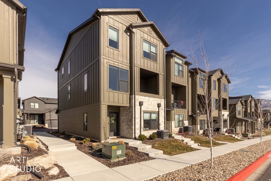 Turnkey and fully furnished end-row townhome in Mountain Green, offering the closest lodging to Snowbasin Ski Resort. Wake up to stunning mountain views and enjoy true move-in-ready convenience. Furnishings valued at over $30,000 (75% of retail value). Nightly rentals are permitted, making this an excellent investment opportunity. Resort-style amenities include a pool, hot tubs, pickleball courts, playground, and fire pits-perfect for year-round mountain living or rental appeal.