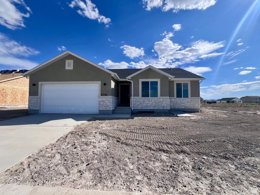 Brand new 3 bed 2 bath rambler! Open floor plan w/vaulted ceilings. Upgraded flooring, soft close cabinets, under mount sink, tankless water heater, oversized slider. Single family living with model home upgrades! Ask about the builders preferred lender incentives.
