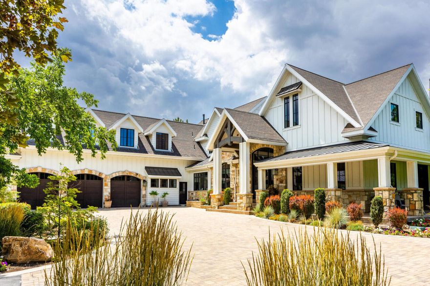 Stunning 3-acre estate showcasing a beautiful custom home and an unmatched resort-style setting. The property features your own private waterpark with a commercial water slide, two pools, and an in-ground hot tub, plus a 4,556 SF guest house (listed as the third floor of the home) with excellent Airbnb potential. Additional living options include a mother-in-law apartment/attached ADU with a private entrance and a detached ADU completed in 2024.  Tucked away at the end of a private driveway off Redwood Road, this estate offers exceptional privacy and tranquility, while also providing the convenience of a private on-site office just a two-minute walk away inside the second home-ideal for a no-commute work lifestyle.  Step inside the custom home and enjoy a bright, welcoming entry that opens to a spacious living room with vaulted ceilings and expansive windows, perfect for both relaxing and entertaining. The adjacent kitchen is equipped with high-end Thermador built-in appliances and offers both formal and semi-formal dining areas. The main level includes a luxurious primary suite with a bright and spacious primary bathroom.  Upstairs, you'll find three bedrooms, three bathrooms, and two family rooms, including a mother-in-law apartment. The fully finished basement offers a full kitchen, billiards room, family room, and two additional bedrooms, creating an ideal space for guests or extended living. Car enthusiasts and entertainers alike will appreciate the 6-car garage and heated driveway. The outdoor amenities are equally impressive, featuring two resort-style pools with a commercial water slide and pavilion, a pickleball court, play structure, and an on-site salon. The beautifully landscaped grounds include recirculating streams, tennis courts, and a playground, offering endless opportunities for recreation and relaxation.  Designed for self-reliance, the home includes an underground propane tank and a 22 kW generator, capable of powering the property for weeks if needed. Culinary water is supplied by well water, with sufficient well certificates to fully irrigate all grass and landscaping.  In the guest home, you'll find 5 bedrooms, 5.5 bathrooms, a gorgeous gourmet kitchen, designed to entertain and open space for gathering.  There is parking for 18 vehicles,   This is a rare opportunity to own a truly luxurious, private estate that seamlessly combines resort-style living with professional functionality. With access off Rylie Ann Circle, the buyer has the option to change the address from Redwood Road to Rylie Ann Circle.