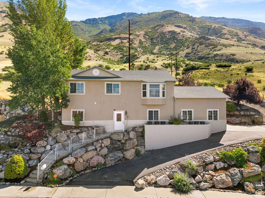Rare opportunity to own an exceptional home that offers a combination of privacy, scenery, and serenity. This 4 bed, 3 full bath, extremely clean home backs up to the mountains and borders the Bonneville Shoreline trail, making outdoor recreation a breeze! Highest home on the hill provides million dollar views of the lake and valley below. Home is conveniently located within a 10-15 minute drive to BYU, downtown Provo, and Provo airport. With nature as your neighbor and views that never get old, this is more than just a home - it's a lifestyle.