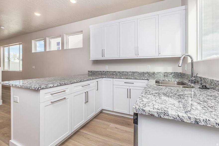 New Construction in Cedar City, Utah! This stunning 4 bed, 2.5 bath home features a spacious main-level master suite, elegant stone countertops, and 9-foot ceilings throughout. Abundant natural light and a bright fills the home, open floor plan with two inviting family rooms-perfect for entertaining or relaxing. The modern kitchen features tasteful. finishes and plenty of storage and a pocket office. Fully finished with landscape, blinds and fencing included. Thoughtfully designed for comfort and function, this home combines style, space, and convenience in a desirable neighborhood. Seller will provide up to $3,500 towards buyer's closing costs when using preferred lender.