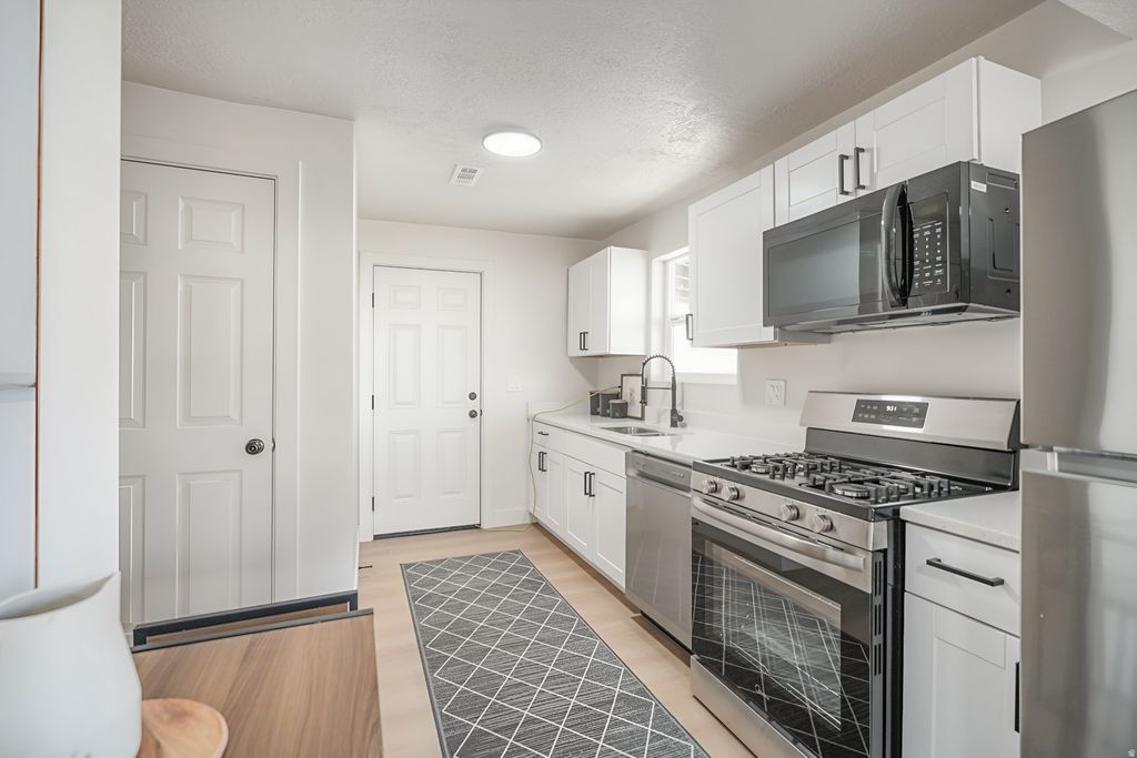 Photo of 1563 W INDIANA AVE N, Salt Lake City, UT 84104 (MLS # 2139110)