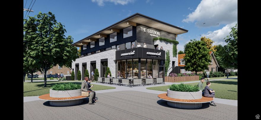 Fantastic development opportunity!!  8 studio loft units plus a small ground level commercial unit.  Just under 6,000. feet of developed multi use space.  Price includes plans.  All utilities are already present to the two small buildings presently on the property.  Located just one block from the trax station.  Currently zoned mixed use.  Seller financing with large down and short term.