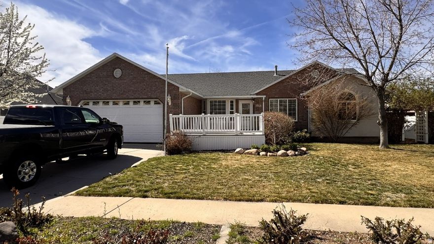Spacious 5BD/3.5BA rambler in a great Spanish Fork neighborhood. 3,143 sq ft finished plus storage on a .243acre fully fenced lot with RV parking. Vaulted ceilings, gas fireplace, and new paint & carpet. Large covered deck, sprinkler system, raised garden beds, and kids' playset included. Mainfloor primary suite with walkin closet, jetted tub, and separate shower. Finished basement with family room + office/flex room. Furnace, A/C, and appliances updated in last 5 years. Sold asis-front porch needs repair and roof will need replacement in next 5 years. Close to parks, churches, and schools. No HOA. Vacant and easy to show.