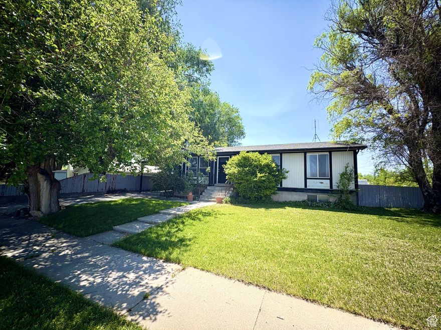 Large home with Mother-in-law apartment and separate entrance! Very well-maintained, includes detached shop garage with power and backyard access. Fully fenced yard has big trees and auto sprinkling system. Great location by schools and parks makes a great investment property.  Welcome Home.