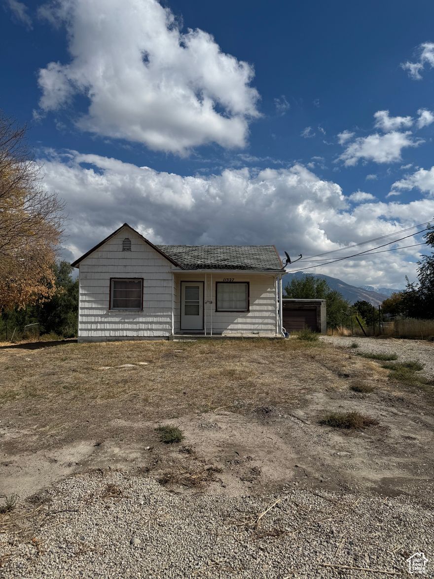 Square ft figures are provided as a estimate only and were obtained from Seller. Buyer advised to obtain measurement. Incredible views. Is next to another seller listing 1.3 acres and home. Home being SOLD AS IS! Could be purchased with adjacent property.